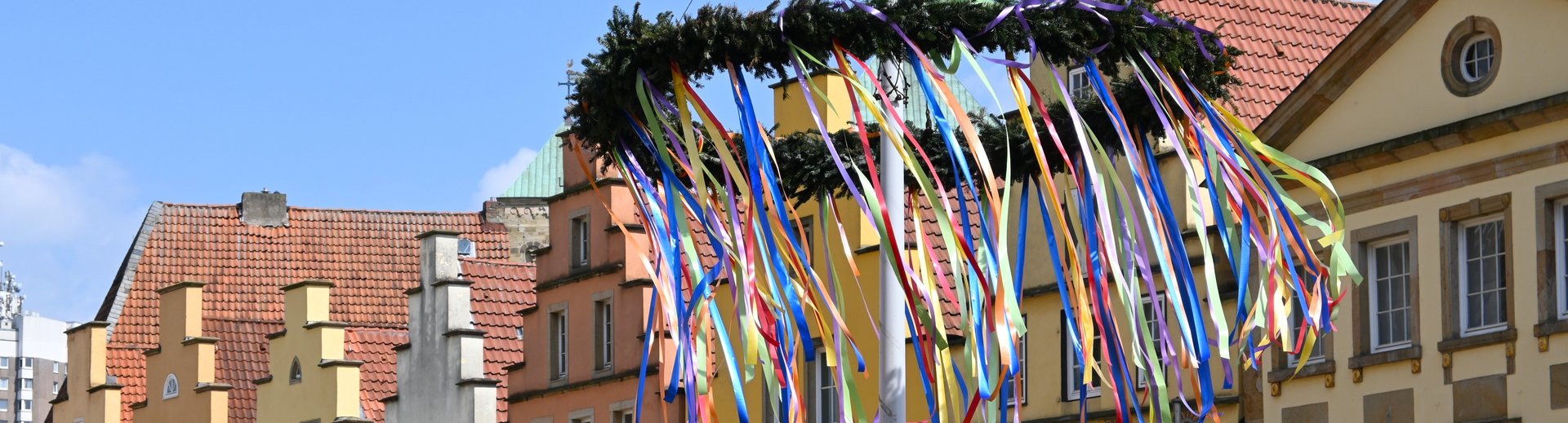 Gabled houses with May wreath on the market square